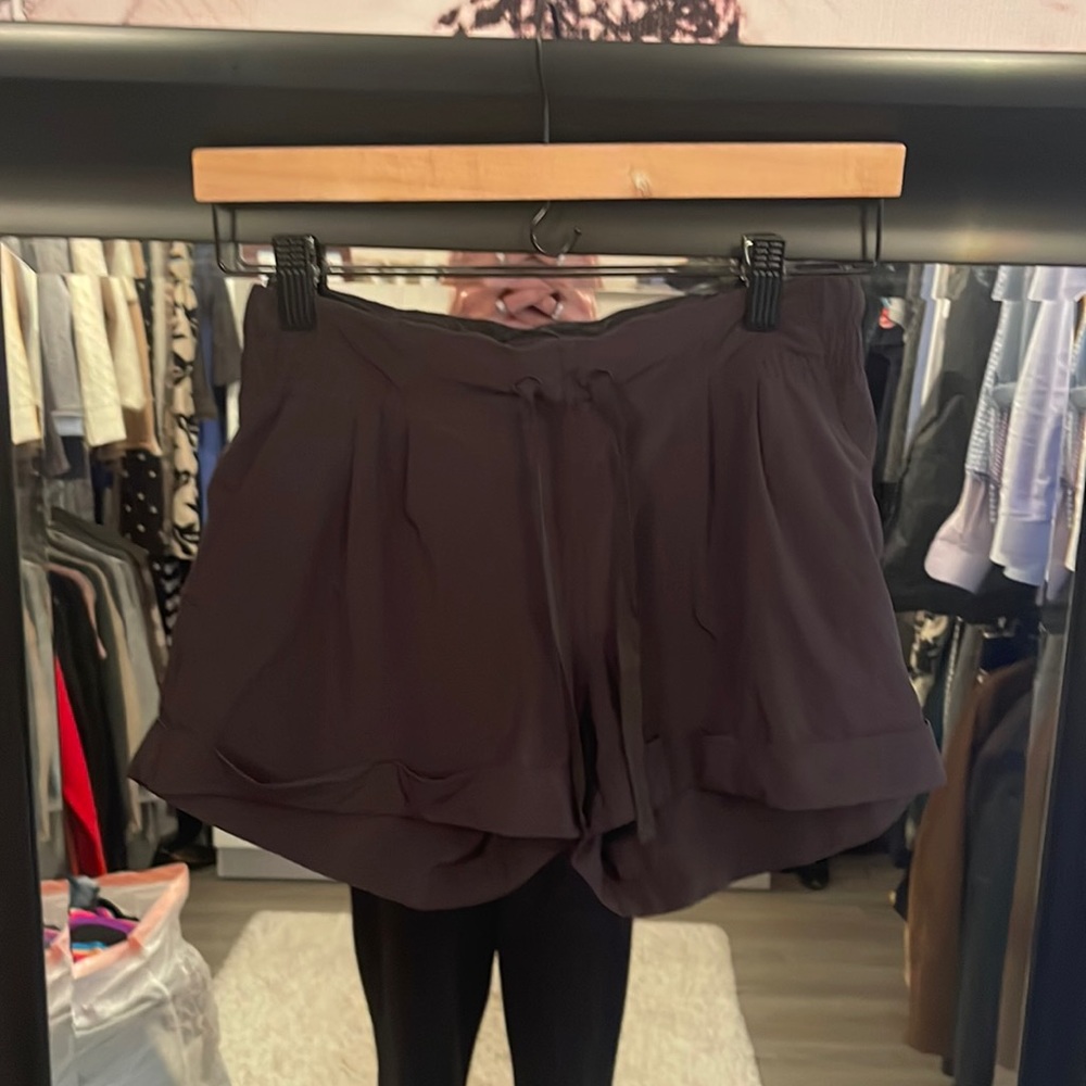 Lulu lemon cuffed shorts.  Dry fit material.